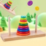 Gioco educativo montessori in legno 8 dischi anelli colorati impilabili a torre - immagine 2